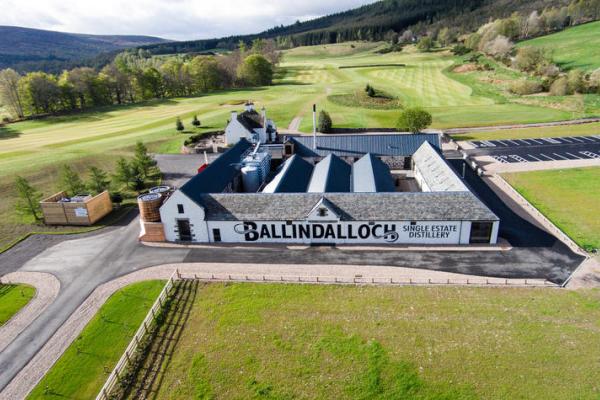 Aerial shot of Ballindoch Distilliery in Scotland, surrounded by greenery