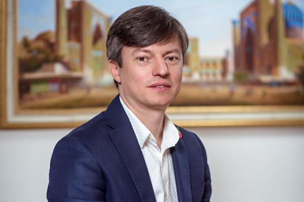 Dmitry Revin smiling to camera