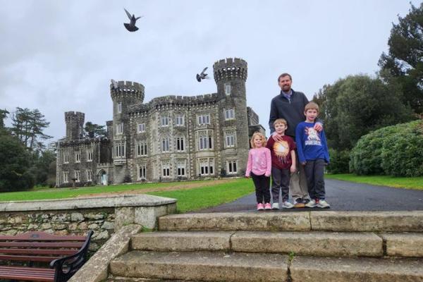 Ford and famly in front of castle