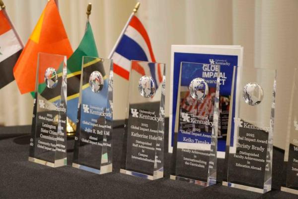 Awards on table surrounded by small flags