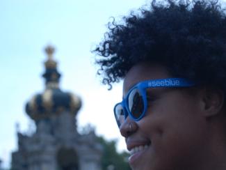 Student with UK GoBlue glasses